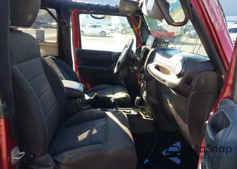 2011 Jeep Wrangler Rubicon z USA, uszkodzony, nr VIN 1J4BA6D18BL515805